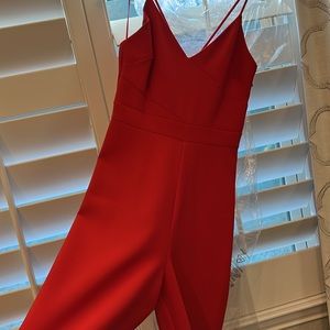 Likely red romper/jumpsuit